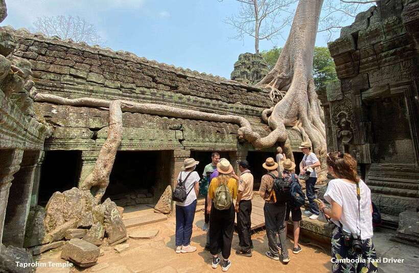 From Phnom Penh: Angkor Wat, Bayon, and Ta Prohm Day Trip - Bayon Temple: the 216 faces and the calm inside the corridors