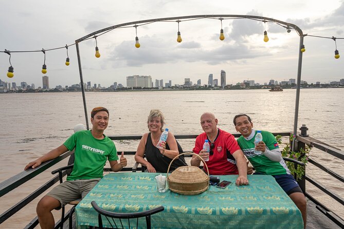 Phnom Penh Bike & Boat Sunset Tour / E-Bike Available - Silk Island Community Center and the Silk House: watch thread become tradition