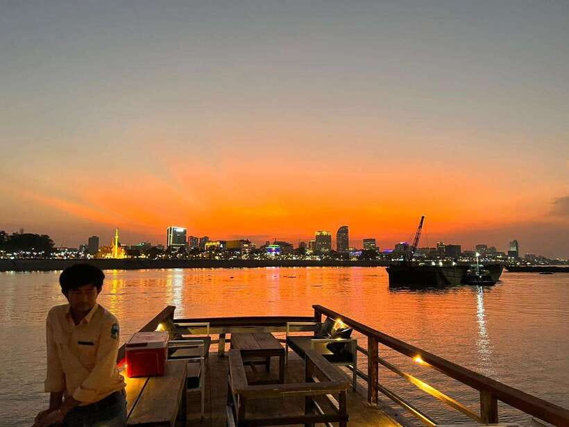 Phnom Penh: Mekong River Sunset Cruise with free flow drink - A Wooden Boat Sunset Over Phnom Penh