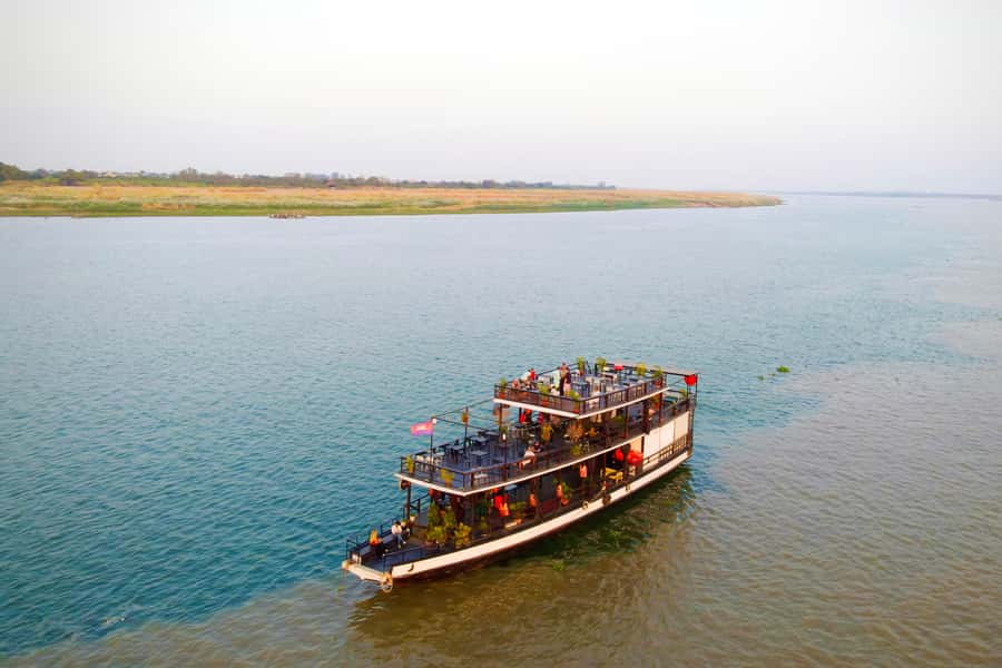 Phnom Penh: Sunset Cruise with Unlimited Beer &Fruit platter - Getting There by Tuk-Tuk and Finding Amazing Cambodia Cruises