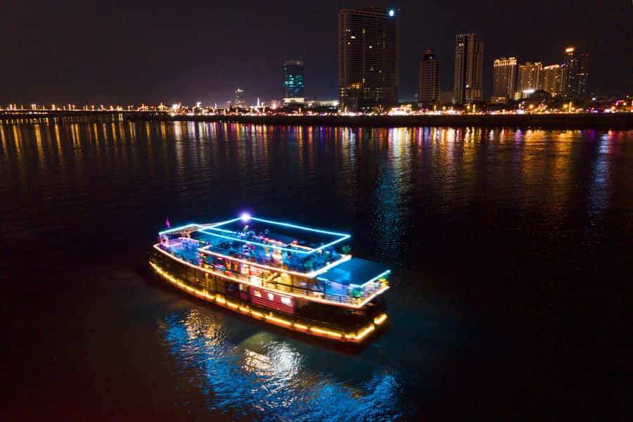 Phnom Penh: Sunset Dinner Cruise with English Speaking Guide - A Mekong sunset cruise with city views and real river life