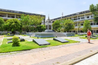 Remnants of a Khmer Rouge Era - Choeung Ek Killing Fields: the memorial stupa and the excavations
